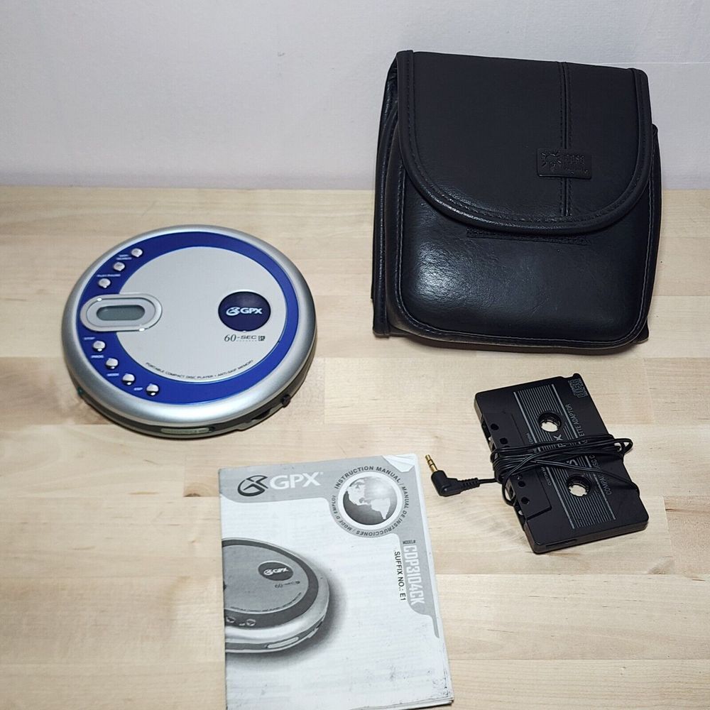 GPX Personal CD Player‎ w/ Car Cassette Adapter And Logitech Case